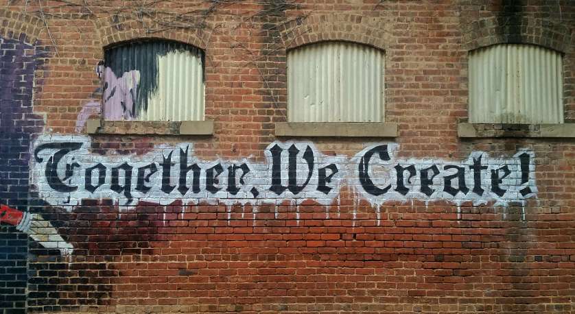 street art that says "Together, We Create!"